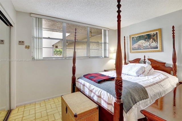 bedroom with a textured ceiling