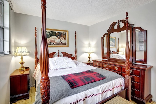 bedroom featuring a textured ceiling