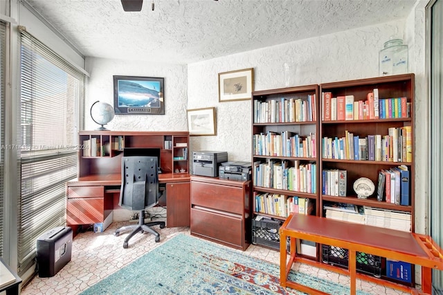 office area featuring a textured ceiling