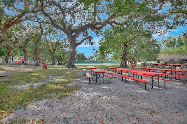 view of community with a water view