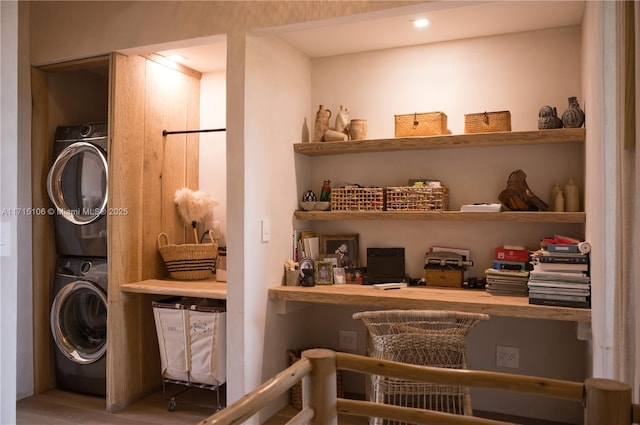 pantry with stacked washer / dryer