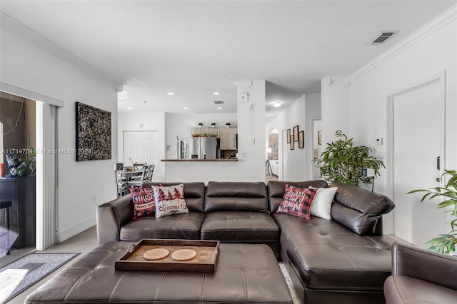 living room with crown molding