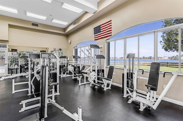 gym with a water view