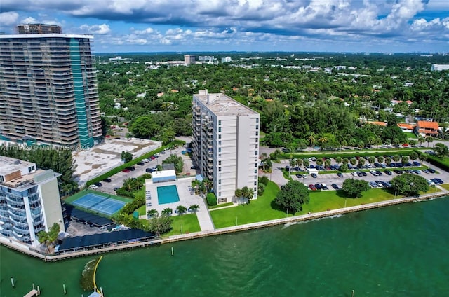 drone / aerial view featuring a water view and a city view