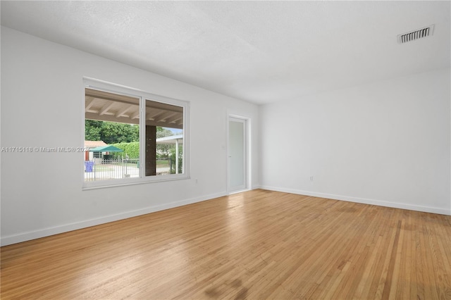 empty room featuring light wood-type flooring