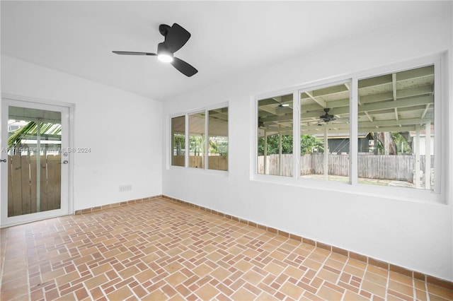 unfurnished sunroom with plenty of natural light