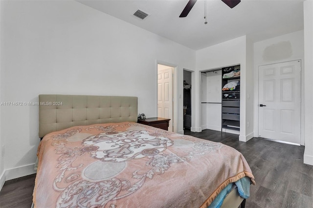 bedroom featuring ceiling fan, a closet, and dark hardwood / wood-style floors