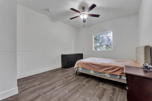 bedroom with hardwood / wood-style flooring and ceiling fan