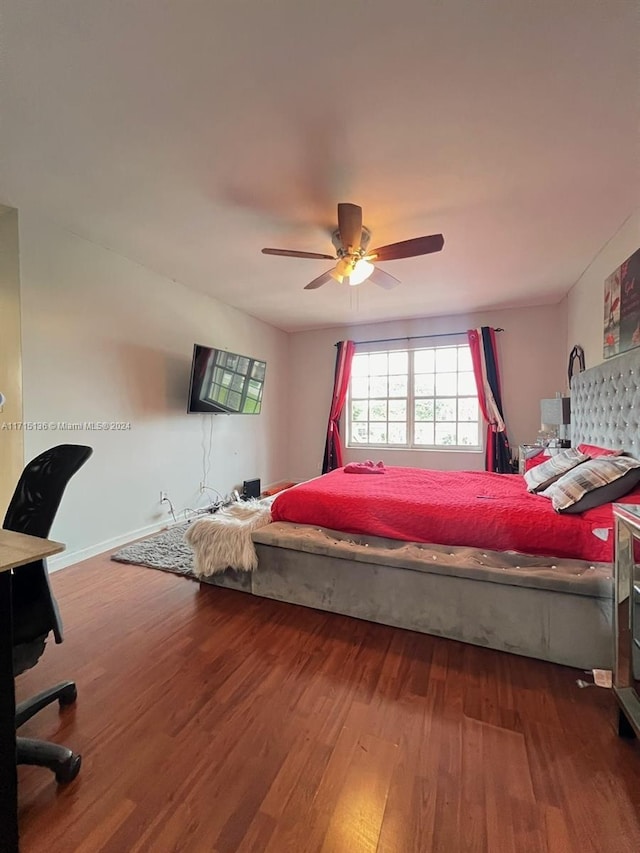 bedroom featuring wood-type flooring and ceiling fan