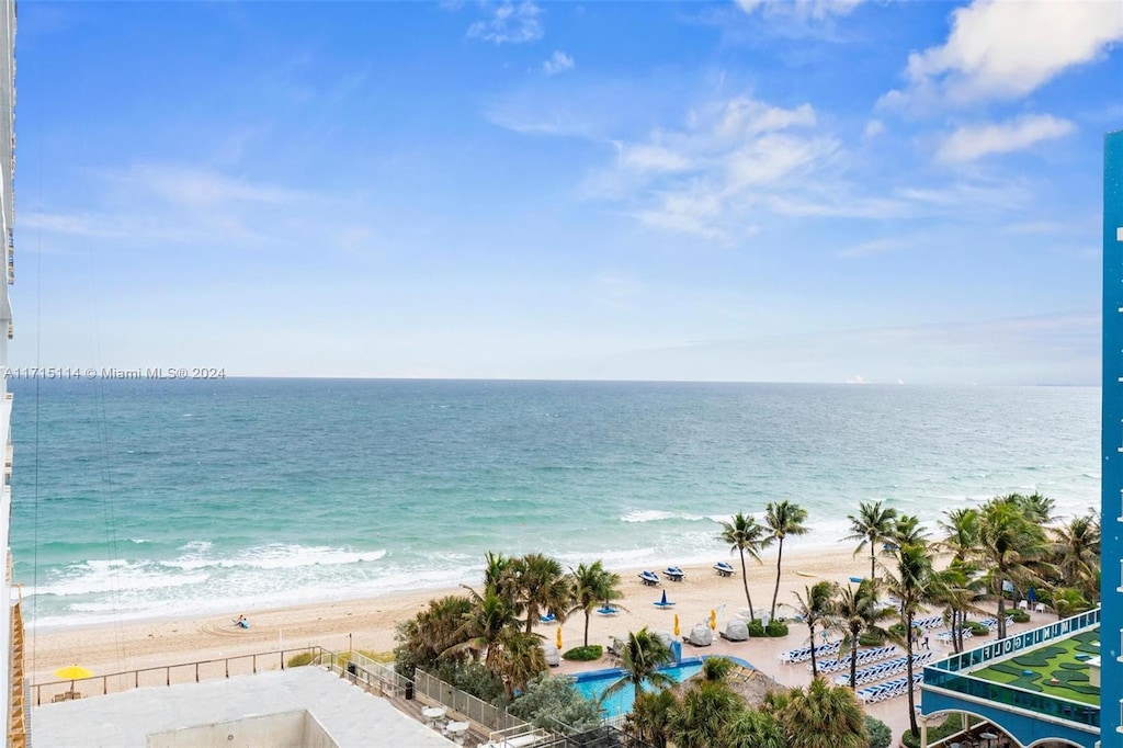 view of water feature with a beach view