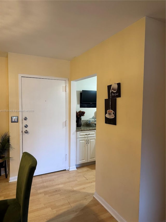 hallway featuring light wood-type flooring