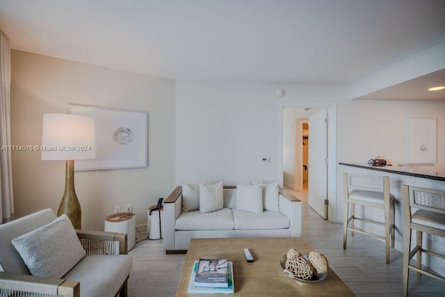 living room with light hardwood / wood-style floors