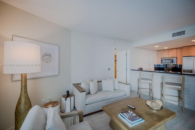 living room featuring light hardwood / wood-style floors