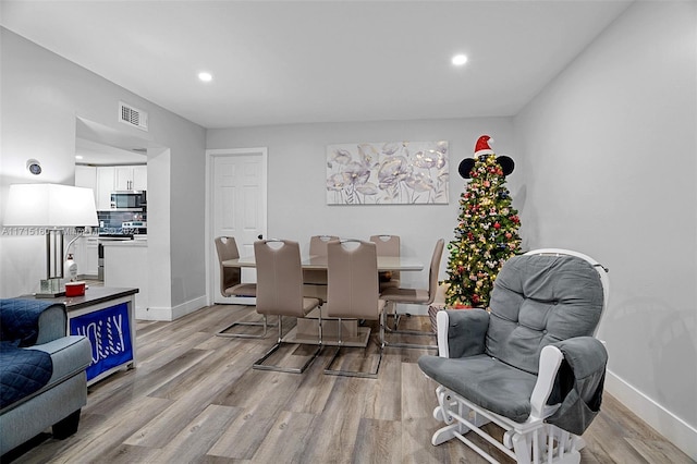 dining area featuring light hardwood / wood-style flooring