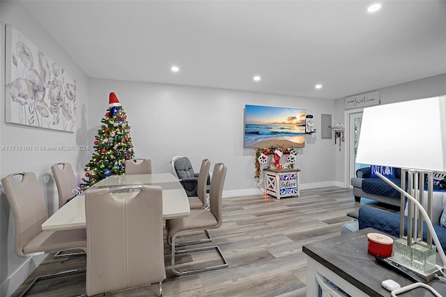 dining space with light hardwood / wood-style floors