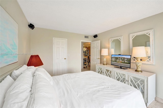 bedroom with a textured ceiling