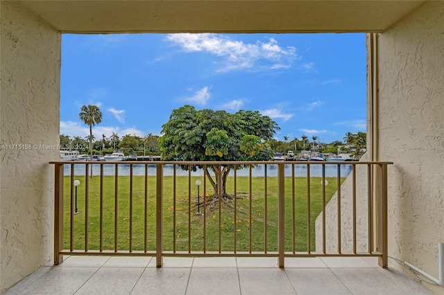 balcony featuring a water view