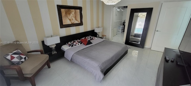 bedroom featuring light tile patterned flooring