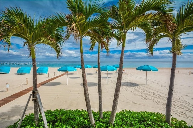 property view of water featuring a view of the beach