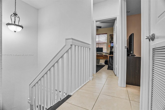 hall with light tile patterned flooring