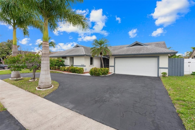 ranch-style home with a garage