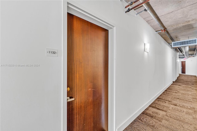 hall featuring wood-type flooring