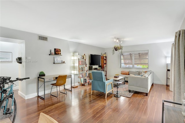 living room with hardwood / wood-style flooring