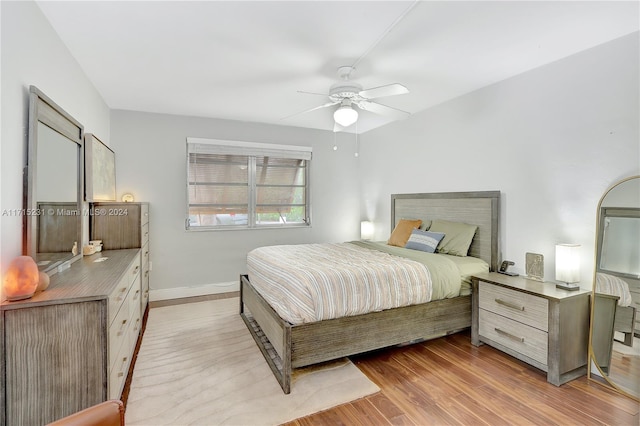 bedroom featuring ceiling fan and light wood-type flooring