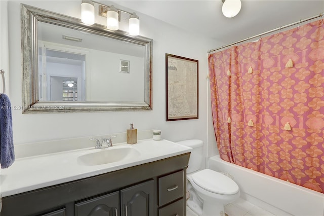 full bathroom featuring shower / bath combination with curtain, toilet, and vanity