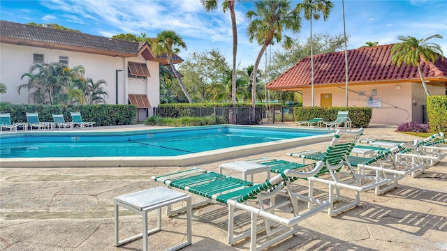 view of pool featuring a patio area