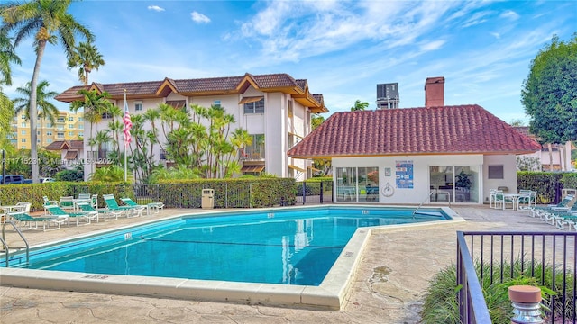 view of pool featuring a patio