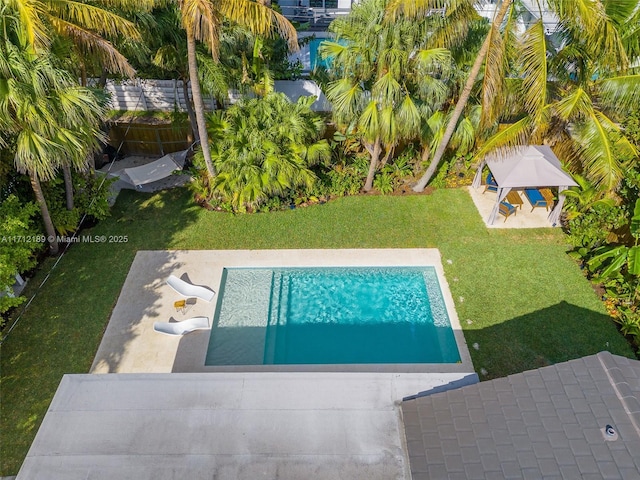 view of swimming pool with a gazebo, a lawn, and a patio