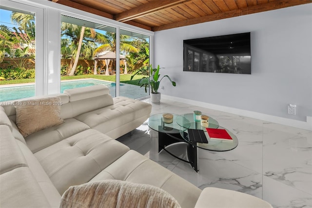 living room with beamed ceiling and wooden ceiling