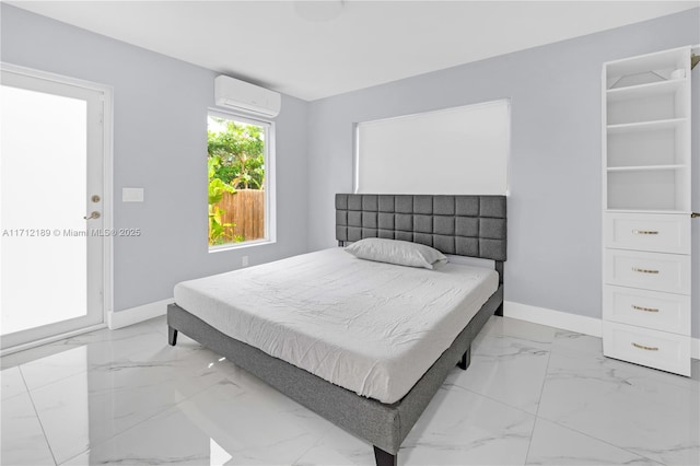 bedroom with a wall mounted air conditioner