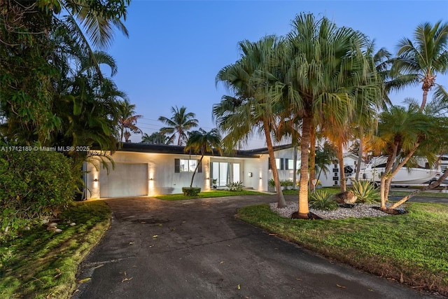 view of front of house with a garage