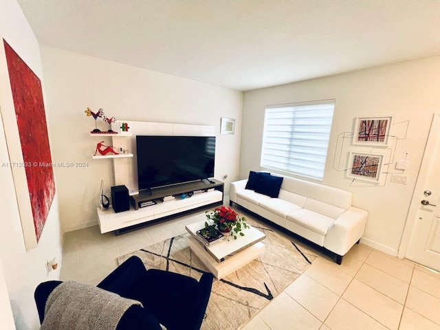 living room featuring light tile patterned flooring