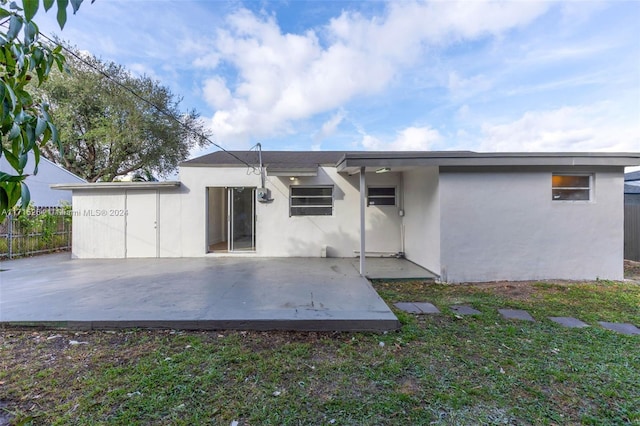 rear view of house featuring a patio area