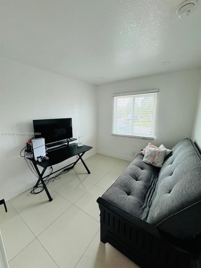 living room featuring a textured ceiling