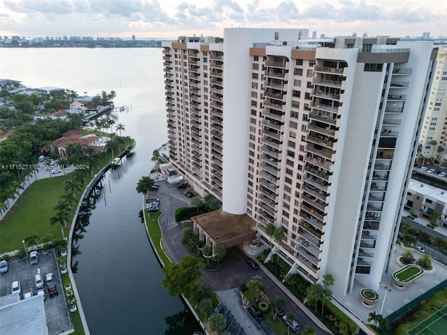 view of building exterior with a water view