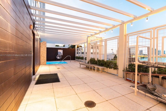 view of patio featuring a pergola