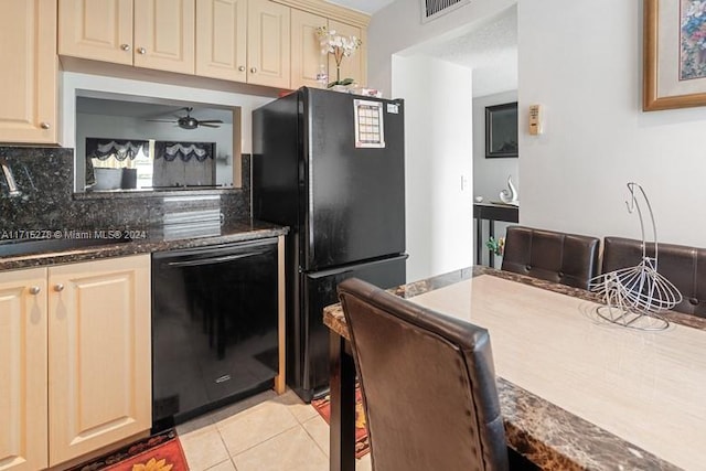 kitchen with decorative backsplash, ceiling fan, sink, black appliances, and light tile patterned floors