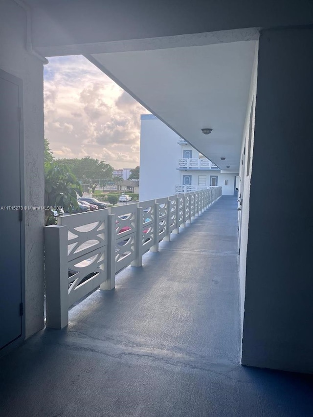 view of balcony at dusk