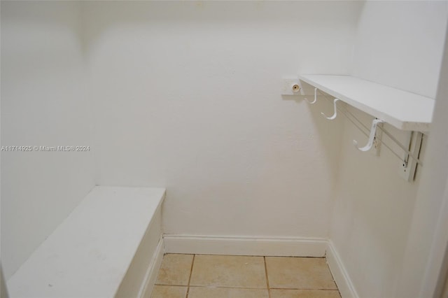 walk in closet featuring light tile patterned floors