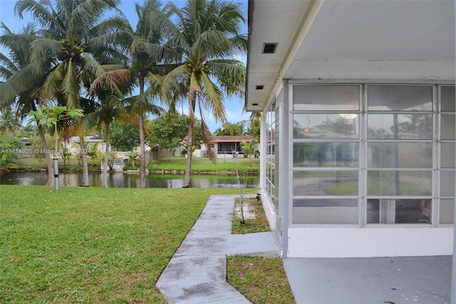 view of yard with a water view