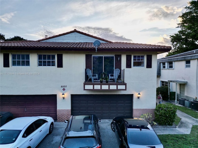 view of front of property with a garage