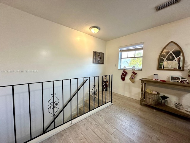 hallway with light wood-type flooring