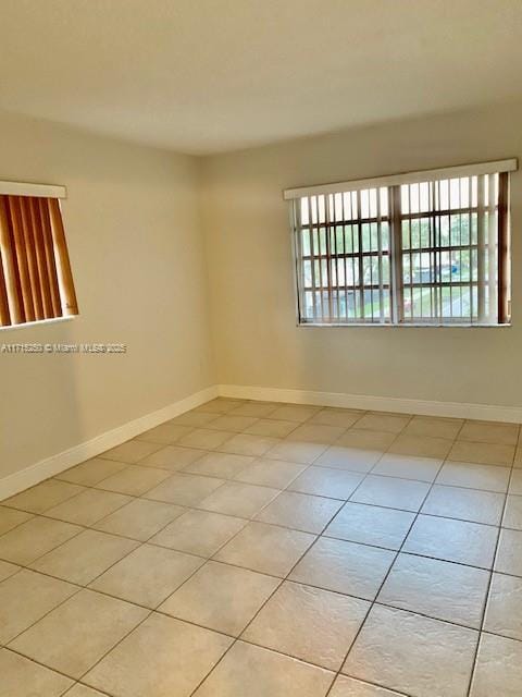 view of tiled spare room