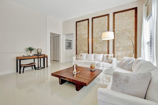 living room with tile patterned floors