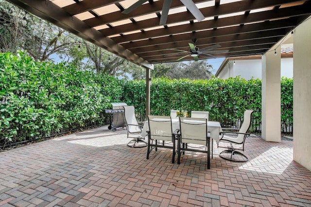 view of patio / terrace with a pergola, grilling area, and ceiling fan