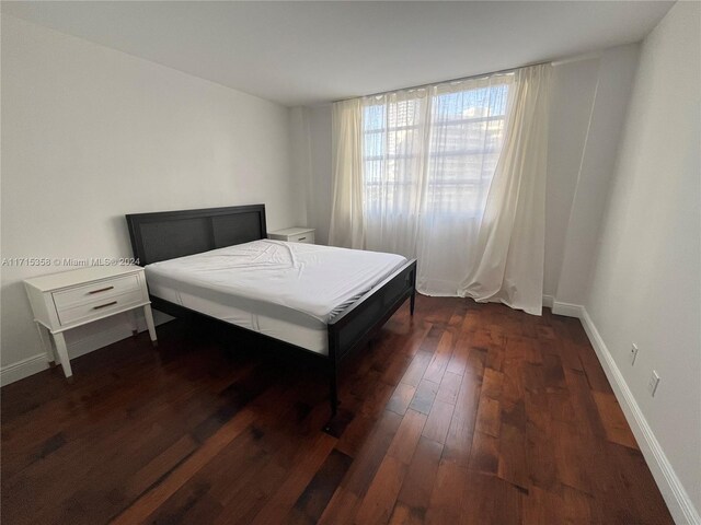 1849 S Ocean Dr Unit 409, Hallandale Beach, FL 33009 - bedroom featuring dark hardwood / wood-style flooring